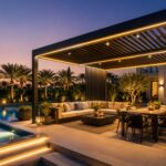 Modern aluminium pergola with integrated LED lighting beside a luxury villa swimming pool in Dubai during the evening.