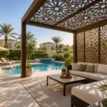 CNC pergola with patterned privacy screens beside a Dubai villa pool