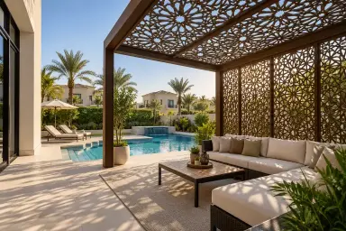 CNC pergola with patterned privacy screens beside a Dubai villa pool